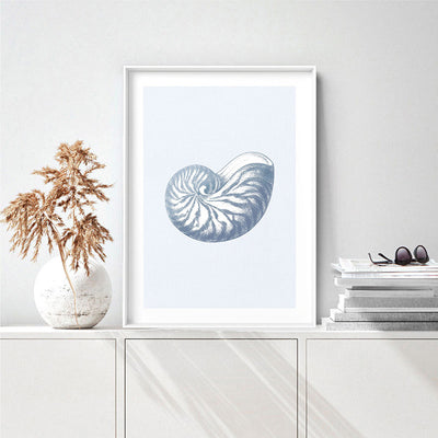 Sea Shells in Blue | Nautilus Shell - Art Print, Poster, Stretched Canvas or Framed Wall Art, shown framed in a room